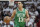 Boston Celtics guard Malcolm Brogdon (13) dribbles the ball during Game 4 of the NBA basketball playoffs Eastern Conference finals against the Miami Heat, Tuesday, May 23, 2023, in Miami. (AP Photo/Wilfredo Lee)