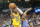 OKLAHOMA CITY, OKLAHOMA - MARCH 01: Mo Bamba #12 of the Los Angeles Lakers grabs a rebound over Aaron Wiggins #21 of the Oklahoma City Thunder during the second quarter at Paycom Center on March 01, 2023 in Oklahoma City, Oklahoma. NOTE TO USER: User expressly acknowledges and agrees that, by downloading and or using this photograph, User is consenting to the terms and conditions of the Getty Images License Agreement. (Photo by Ian Maule/Getty Images)