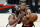 PORTLAND, OREGON - MARCH 23: James Harden #13 of the Brooklyn Nets loses control of the ball while defended by Rodney Hood #5 of the Portland Trail Blazers during the first quarter at Moda Center on March 23, 2021 in Portland, Oregon. NOTE TO USER: User expressly acknowledges and agrees that, by downloading and or using this photograph, User is consenting to the terms and conditions of the Getty Images License Agreement. (Photo by Steph Chambers/Getty Images)