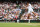 LONDON, ENGLAND - JULY 11: Novak Djokovic of Serbia in action against Andrey Rublev during the Men's Singles Quarter Final match during day nine of The Championships Wimbledon 2023 at All England Lawn Tennis and Croquet Club on July 11, 2023 in London, England. (Photo by Julian Finney/Getty Images)