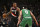 PORTLAND, OREGON - MARCH 17: Damian Lillard #0 of the Portland Trail Blazers dribbles against Derrick White #9 of the Boston Celtics during the second quarter at the Moda Center on March 17, 2023 in Portland, Oregon. NOTE TO USER: User expressly acknowledges and agrees that, by downloading and or using this photograph, User is consenting to the terms and conditions of the Getty Images License Agreement. (Photo by Alika Jenner/Getty Images)