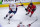 CHICAGO, IL - JANUARY 20: Washington Capitals center Evgeny Kuznetsov (92) controls the puck while defending and holding onto the stick of Chicago Blackhawks center Jonathan Toews (19) during a game between the Washington Capitals and the Chicago Blackhawks on January 20, 2019, at the United Center in Chicago, IL. (Photo by Patrick Gorski/Icon Sportswire via Getty Images)