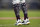 Miami Marlins third base/infield coach Jody Reed wears USA socks for the July 4th holiday during the first inning of a baseball game against the St. Louis Cardinals, Tuesday, July 4, 2023, in Miami. (AP Photo/Lynne Sladky)