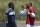 Dallas Cowboys linebacker Micah Parsons, left, talks with quarterback Dak Prescott during the NFL football team's training camp Thursday, July 27, 2023, in Oxnard, Calif. (AP Photo/Mark J. Terrill)