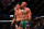Nate Diaz (left) and Conor McGregor react after their second fight.
