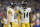 Pittsburgh Steelers wide receiver George Pickens (14) and Pittsburgh Steelers quarterback Kenny Pickett (8) talk on the field during an NFL football game against the Indianapolis Colts, Monday, Nov. 28, 2022, in Indianapolis. (AP Photo/Zach Bolinger)