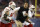 PHOENIX, ARIZONA - DECEMBER 27: Head coach Luke Fickell of the Wisconsin Badgers runs onto the field to call a time out during the second half of the Guaranteed Rate Bowl against the Oklahoma State Cowboys at Chase Field on December 27, 2022 in Phoenix, Arizona. (Photo by Chris Coduto/Getty Images)