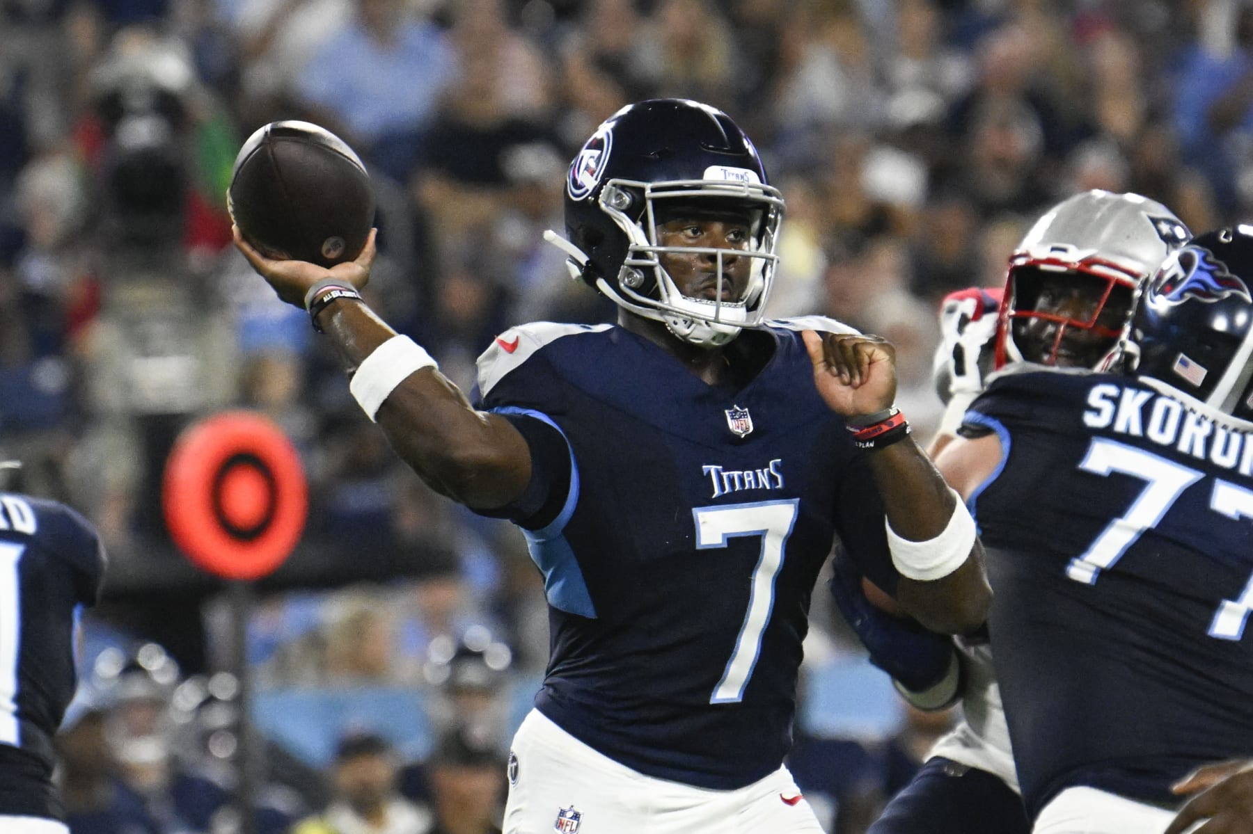 Tennessee Titans quarterback Malik Willis (7) passes in the first half of an NFL preseason football game against the New England Patriots Friday, Aug. 25, 2023, in Nashville, Tenn. (AP Photo/John Amis)