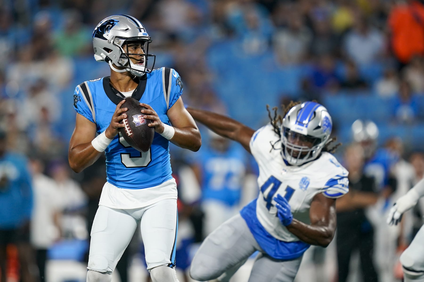 Carolina Panthers quarterback Bryce Young looks to pass against the Detroit Lions during the first half of a preseason NFL football game Friday, Aug. 25, 2023, in Charlotte, N.C. (AP Photo/Erik Verduzco)