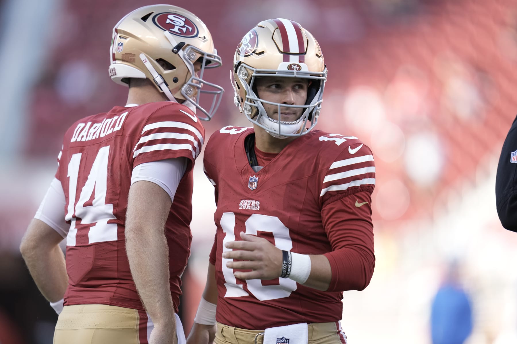 Sam Darnold (left) and Brock Purdy (right)