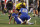CHICAGO, ILLINOIS - AUGUST 2: Christopher Nkunku of Chelsea goes down with an injury in the first half resulting in him leaving the game during the pre-season friendly match between Chelsea FC and Borussia Dortmund at Soldier Field on August 2, 2023 in Chicago, Illinois. (Photo by Matthew Ashton - AMA/Getty Images)