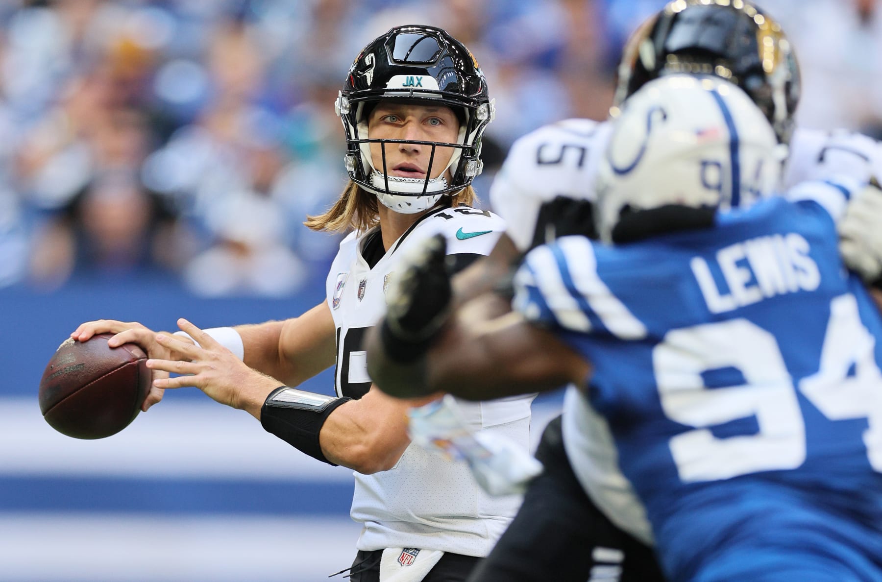 INDIANAPOLIS, INDIANA - OCTOBER 16:  Trevor Lawrence #16 of the Jacksonville Jaguars towards the Indianapolis Colts  at Lucas Oil Stadium on October 16, 2022 in Indianapolis, Indiana. (Portray by Andy Lyons/Getty Photos)
