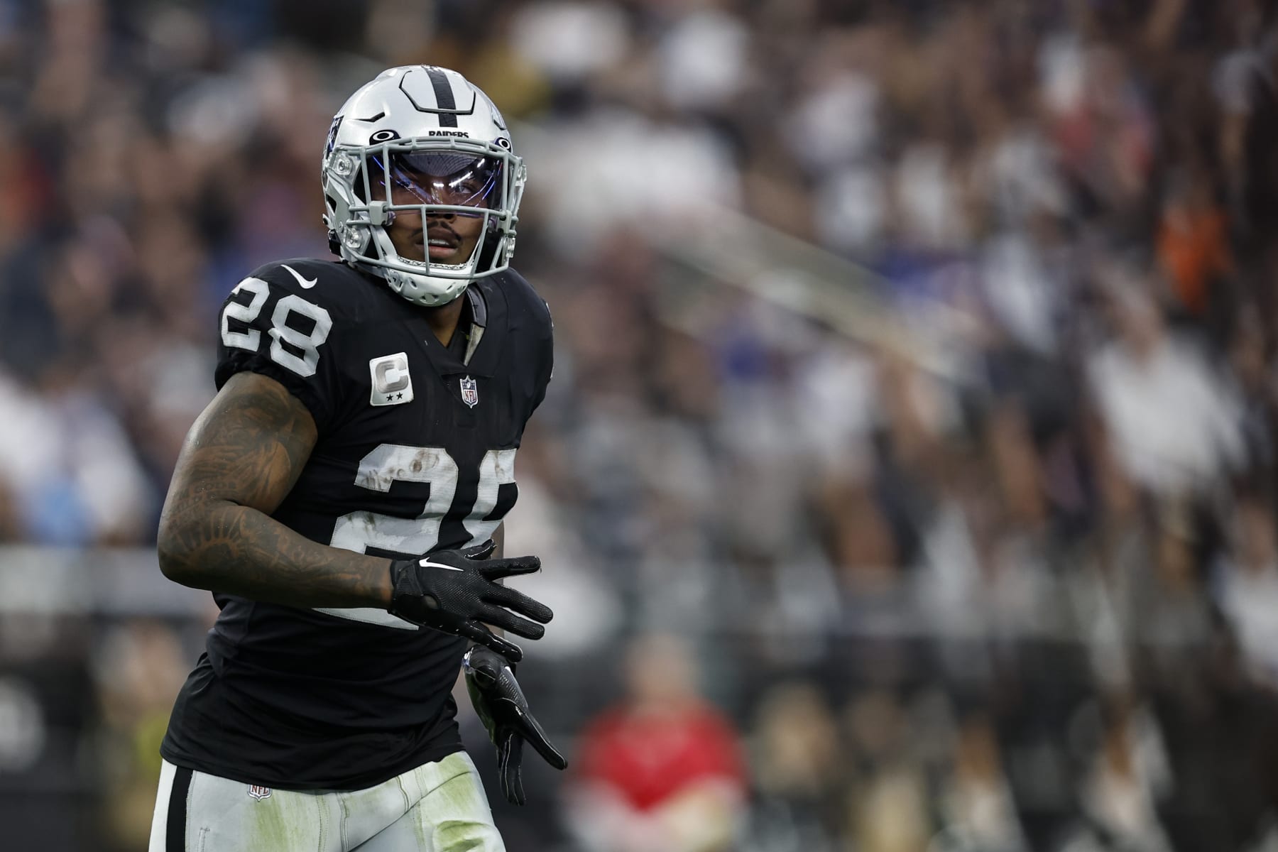 LAS VEGAS, NEVADA - DECEMBER 18: Josh Jacobs #28 of the Las Vegas Raiders runs for the length of an NFL football sport between the Las Vegas Raiders and the Unusual England Patriots at Allegiant Stadium on December 18, 2022 in Las Vegas, Nevada. (Portray by Michael Owens/Getty Photos)