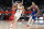 WASHINGTON, DC - FEBRUARY 05: Devin Booker #1 of the Phoenix Suns handles the ballin the third quarter against Kyle Kuzma #33 of the Washington Wizards at Capital One Arena on February 05, 2022 in Washington, DC. NOTE TO USER: User expressly acknowledges and agrees that, by downloading and or using this photograph, User is consenting to the terms and conditions of the Getty Images License Agreement. (Photo by G Fiume/Getty Images)