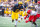 ANN ARBOR, MICHIGAN - SEPTEMBER 09: Blake Corum #2 of the Michigan Wolverines runs for extra yardage against Jett Elad #9 of the UNLV Rebels during the first half of a college football game at Michigan Stadium on September 09, 2023 in Ann Arbor, Michigan. (Photo by Aaron J. Thornton/Getty Images)