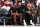 HOUSTON, TX - MARCH 28: From left, Bryce James, LeBron James and Savannah James sit in the front row watching McDonald's High School All-American Bronny James at Toyota Center game during the 2023 McDonald's High School Boys All-American Game. (Photo by Brian Spurlock/Icon Sportswire via Getty Images