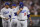 Los Angeles Dodgers starting pitcher Lance Lynn (35) reacts as he exits during the third inning in Game 3 of a baseball NL Division Series against the Los Angeles Dodgers, Wednesday, Oct. 11, 2023, in Phoenix. (AP Photo/Ross D. Franklin)