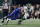 EAST RUTHERFORD, NEW JERSEY - SEPTEMBER 11: (NEW YORK DAILIES OUT) Aaron Rodgers #8 of the New York Jets is sacked during the first quarter by Leonard Floyd #56 of the Buffalo Bills at MetLife Stadium on September 11, 2023 in East Rutherford, New Jersey. The Jets defeated the Bills 22-16 in overtime. (Photo by Jim McIsaac/Getty Images)
