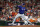 HOUSTON, TEXAS - OCTOBER 15: Jordan Montgomery #52 of the Texas Rangers pitches against the Houston Astros in the first inning during Game One of the American League Championship Series at Minute Maid Park on October 15, 2023 in Houston, Texas. (Photo by Bob Levey/Getty Images)