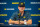 ANN ARBOR, MICHIGAN - OCTOBER 14: Head Coach Jim Harbaugh of the Michigan Wolverines speaks to media during the post-game press conference after a college football game against the Indiana Hoosiers at Michigan Stadium on October 14, 2023 in Ann Arbor, Michigan. The Michigan Wolverines won the game 52-7. (Photo by Aaron J. Thornton/Getty Images)
