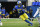INGLEWOOD, CA - OCTOBER 16: Darrell Henderson Jr. #27 of the Los Angeles Rams runs the ball while playing the Carolina Panthers at SoFi Stadium on October 16, 2022 in Inglewood, California. (Photo by John McCoy/Getty Images)