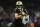 NEW ORLEANS, LA - OCTOBER 19: Taysom Hill #7 of the New Orleans Saints runs the ball during an NFL football game against the Jacksonville Jaguars at Caesars Superdome on October 19, 2023 in New Orleans, Louisiana. (Photo by Cooper Neill/Getty Images)