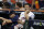 HOUSTON, TEXAS - OCTOBER 23: Jose Altuve #27 of the Houston Astros looks on from the dugout against the Texas Rangers during the eighth inning in Game Seven of the American League Championship Series at Minute Maid Park on October 23, 2023 in Houston, Texas. (Photo by Carmen Mandato/Getty Images)