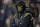 BOULDER, COLORADO - OCTOBER 13: Head coach Deion Sanders of the Colorado Buffaloes walks on the field during pregame against the Stanford Cardinal at Folsom Field on October 13, 2023 in Boulder, Colorado. (Photo by Matthew Stockman/Getty Images)