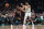 BOSTON, MASSACHUSETTS - OCTOBER 27: Jayson Tatum #0 of the Boston Celtics passes the ball beyond Jimmy Butler #22 of the Miami Heat in the first quarter at TD Garden on October 27, 2023 in Boston, Massachusetts. NOTE TO USER: User expressly acknowledges and agrees that, by downloading and or using this photograph, User is consenting to the terms and conditions of the Getty Images License Agreement. (Photo by Maddie Schroeder/Getty Images)