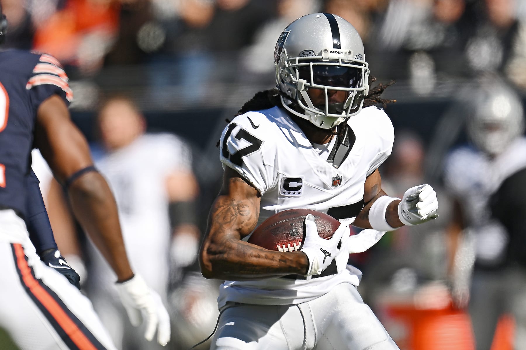 CHICAGO, ILLINOIS - OCTOBER 22: Davante Adams #17 of the Las Vegas Raiders catches a pass during the first quarter against the Chicago Bears at Soldier Field on October 22, 2023 in Chicago, Illinois. (Photo by Quinn Harris/Getty Images)