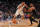 PHOENIX, AZ - OCTOBER 31: Victor Wembanyama #1 of the San Antonio Spurs drives to the basket during the game against the Phoenix Suns on October 31, 2023 at Footprint Center in Phoenix, Arizona. NOTE TO USER: User expressly acknowledges and agrees that, by downloading and or using this photograph, user is consenting to the terms and conditions of the Getty Images License Agreement. Mandatory Copyright Notice: Copyright 2023 NBAE (Photo by Garrett Ellwood/NBAE via Getty Images)