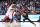 TORONTO, ON - OCTOBER 30: Scoot Henderson #00 of the Portland Trail Blazers drives against O.G. Anunoby #3 of the Toronto Raptors during the first half of their basketball game at the Scotiabank Arena on October 30, 2023 in Toronto, Ontario, Canada. NOTE TO USER: User expressly acknowledges and agrees that, by downloading and/or using this Photograph, user is consenting to the terms and conditions of the Getty Images License Agreement. (Photo by Mark Blinch/Getty Images)