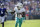 BALTIMORE, MD - SEPTEMBER 18: Miami Dolphins wide receiver Tyreek Hill (10) throws up a peace sign of two fingers after making a catch before running the rest of the way into the end zone for a touchdown during the Miami Dolphins versus Baltimore Ravens NFL game at M&T Bank Stadium on September 18, 2022 in Baltimore, MD (Photo by Randy Litzinger/Icon Sportswire via Getty Images)