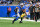 DETROIT, MI - NOVEMBER 23: Detroit Lions wide receiver Amon-Ra St. Brown (14) runs upfield with a catch for a first down during the Detroit Lions versus the Green Bay Packers game on Thursday November 23, 2023 at Ford Field in Detroit, MI. (Photo by Steven King/Icon Sportswire via Getty Images)