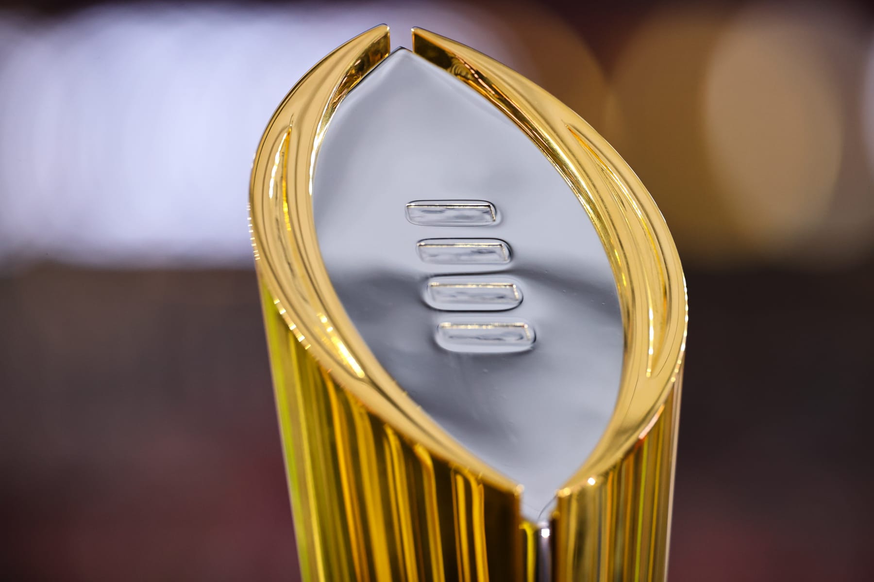 INGLEWOOD, CA - JANUARY 09: The College Football Playoff National Championship Trophy rests on the field before the game between the Georgia Bulldogs and the TCU Horned Frogs held at SoFi Stadium on January 9, 2023 in Inglewood, California. (Photo by Jamie Schwaberow/Getty Images)