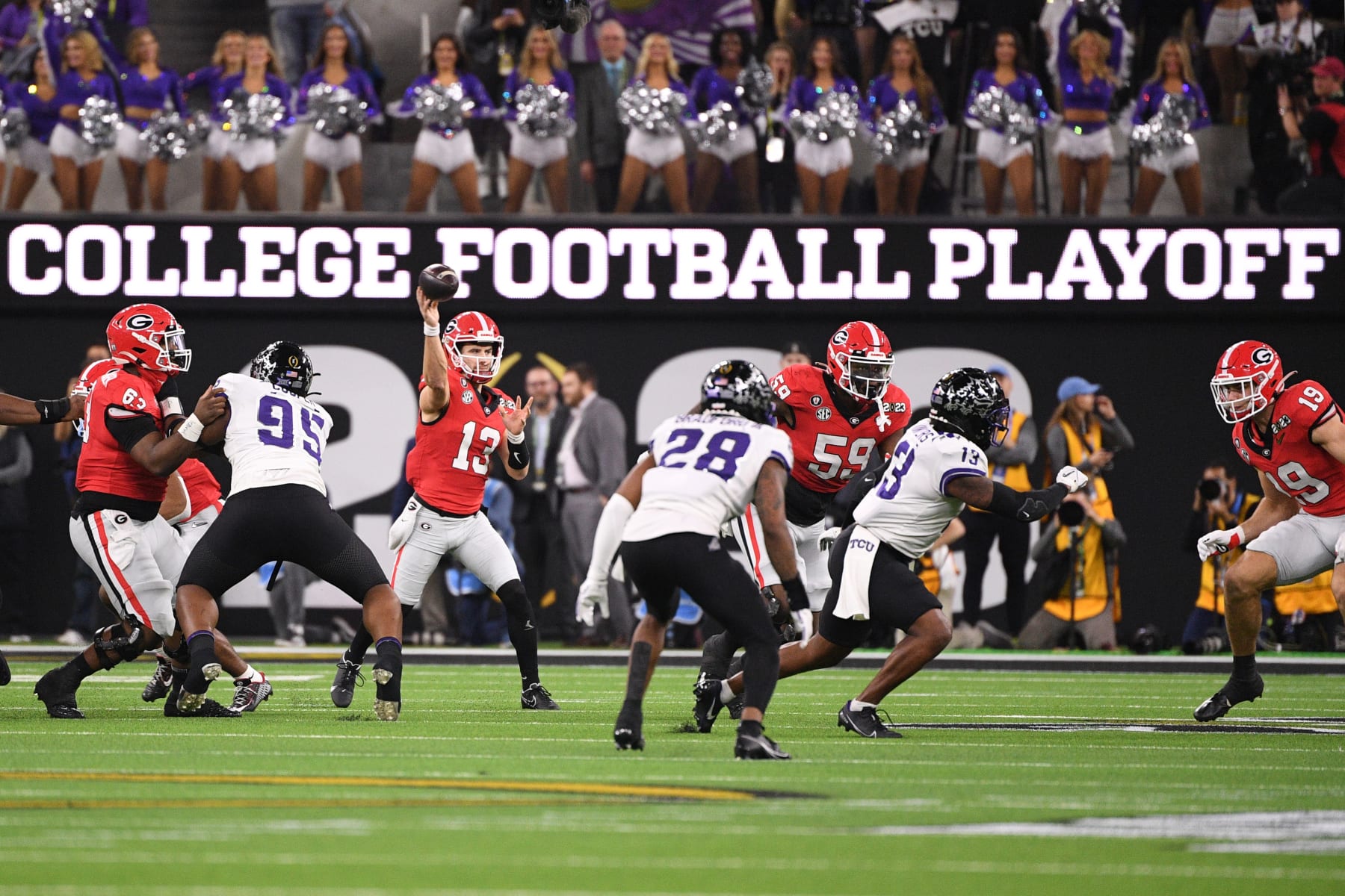 INGLEWOOD, CA - JANUARY 09: Georgia Bulldogs quarterback Stetson Bennett (13) tosses a pass during the Georgia Bulldogs game against the TCU Horned Frogs in the College Football Playoff National Championship game on January 9, 2023, at SoFi Stadium in Inglewood, CA. (Photo by Brian Rothmuller/Icon Sportswire via Getty Images)