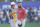 DUBAI, UNITED ARAB EMIRATES - NOVEMBER 19: Jon Rahm of Spain shakes hands with his caddie, Adam Hayes (obscured) on the 18th green during Day Four of the DP World Tour Championship on the Earth Course at Jumeirah Golf Estates on November 19, 2023 in Dubai, United Arab Emirates. (Photo by Andrew Redington/Getty Images)