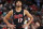 PORTLAND, OR - DECEMBER 14: Shaedon Sharpe #17 of the Portland Trail Blazers looks on during the game on December 14, 2023 at the Moda Center Arena in Portland, Oregon. NOTE TO USER: User expressly acknowledges and agrees that, by downloading and or using this photograph, user is consenting to the terms and conditions of the Getty Images License Agreement. Mandatory Copyright Notice: Copyright 2023 NBAE (Photo by Cameron Browne/NBAE via Getty Images)