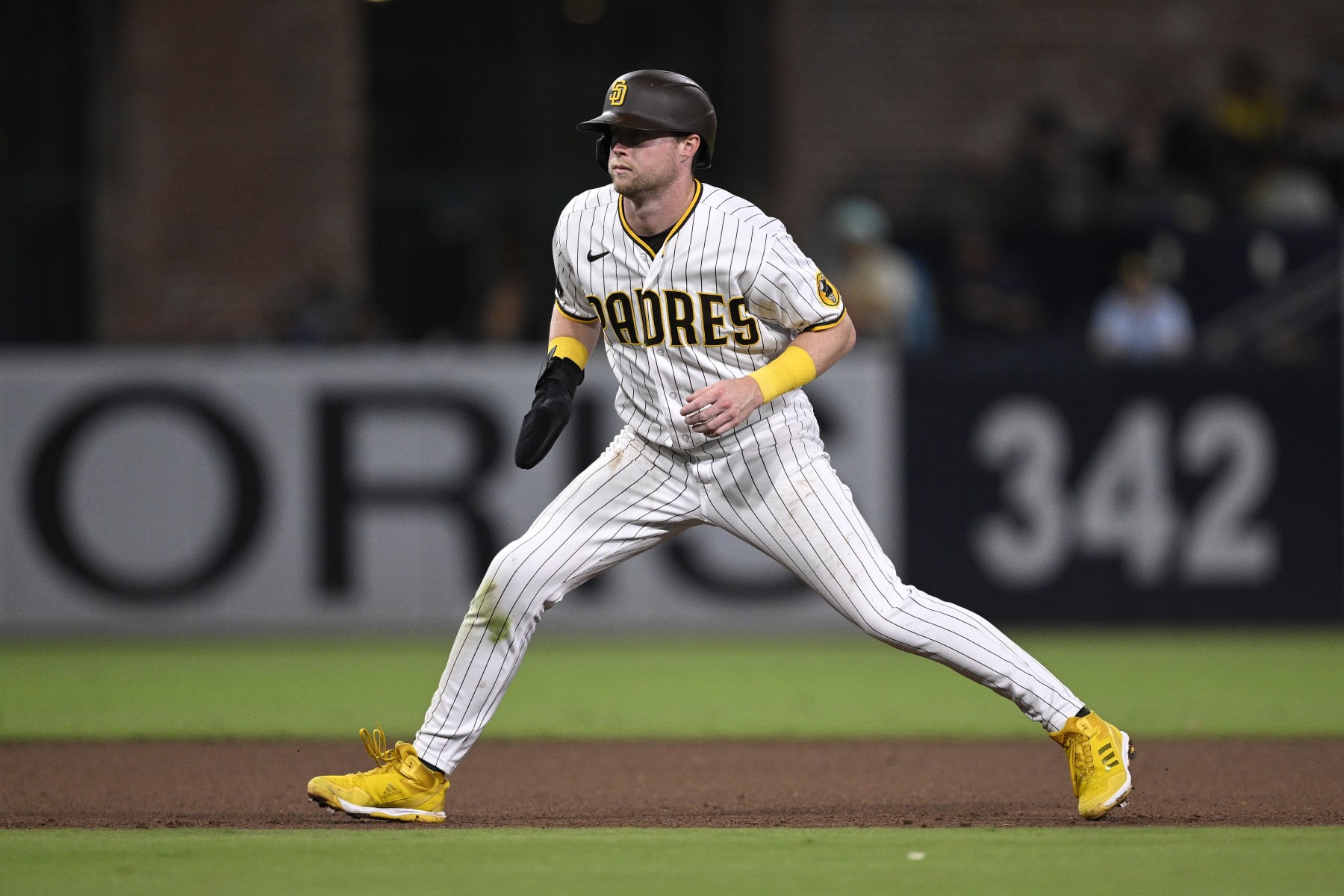 SAN DIEGO, CALIFORNIA - AUGUST 17: Jake Cronenworth #9 of the San Diego Padres leads off second base during the fifth inning against the Arizona Diamondbacks at PETCO Park on August 17, 2023 in San Diego, California. (Photo by Orlando Ramirez/Getty Images)