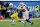 INGLEWOOD, CALIFORNIA - DECEMBER 23: Austin Ekeler #30 of the Los Angeles Chargers runs with the ball while being chased by Tyrel Dodson #25 of the Buffalo Bills in the fourth quarter at SoFi Stadium on December 23, 2023 in Inglewood, California. (Photo by Sean M. Haffey/Getty Images)