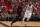 MIAMI, FL - DECEMBER 18: Jimmy Butler #22 of the Miami Heat handles the ball during the game against the Minnesota Timberwolves on December 18, 2023 at Kaseya Center in Miami, Florida. NOTE TO USER: User expressly acknowledges and agrees that, by downloading and or using this Photograph, user is consenting to the terms and conditions of the Getty Images License Agreement. Mandatory Copyright Notice: Copyright 2023 NBAE (Photo by Issac Baldizon/NBAE via Getty Images)