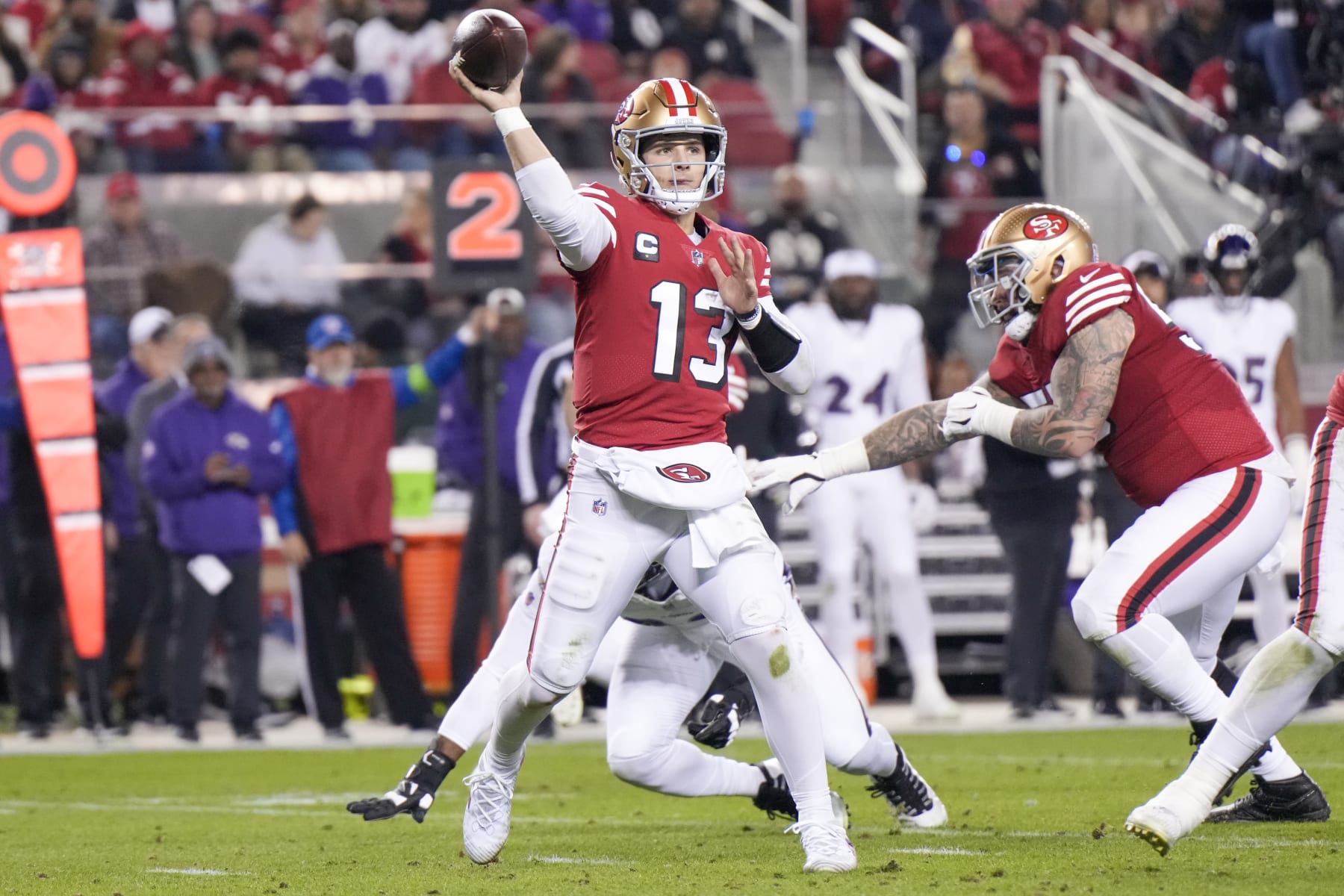SANTA CLARA, CALIFORNIA - DECEMBER 25: Brock Purdy #13 of the San Francisco 49ers attempts a pass during the second quarter against the Baltimore Ravens at Levi's Stadium on December 25, 2023 in Santa Clara, California. (Photo by Loren Elliott/Getty Images)