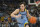 MILWAUKEE, WISCONSIN - DECEMBER 22: Tyler Kolek #11 of the Marquette Golden Eagles dribbles the ball during the first half against the Georgetown Hoyas at Fiserv Forum on December 22, 2023 in Milwaukee, Wisconsin. (Photo by Patrick McDermott/Getty Images)