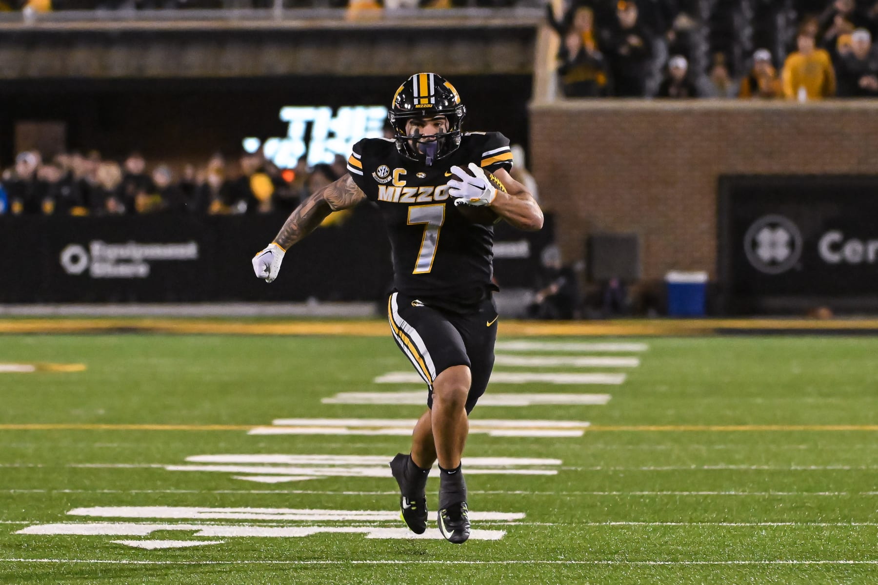 COLUMBIA, MO - NOVEMBER 18: Missouri Tigers running back Cody Schrader (7) finds open space on his way to a long touchdown run during a SEC conference game between the Florida Gators and the Missouri Tigers held on Saturday Nov 18, 2023 at Faurot Field at Memorial Stadium in Columbia MO. (Photo by Rick Ulreich/Icon Sportswire via Getty Images