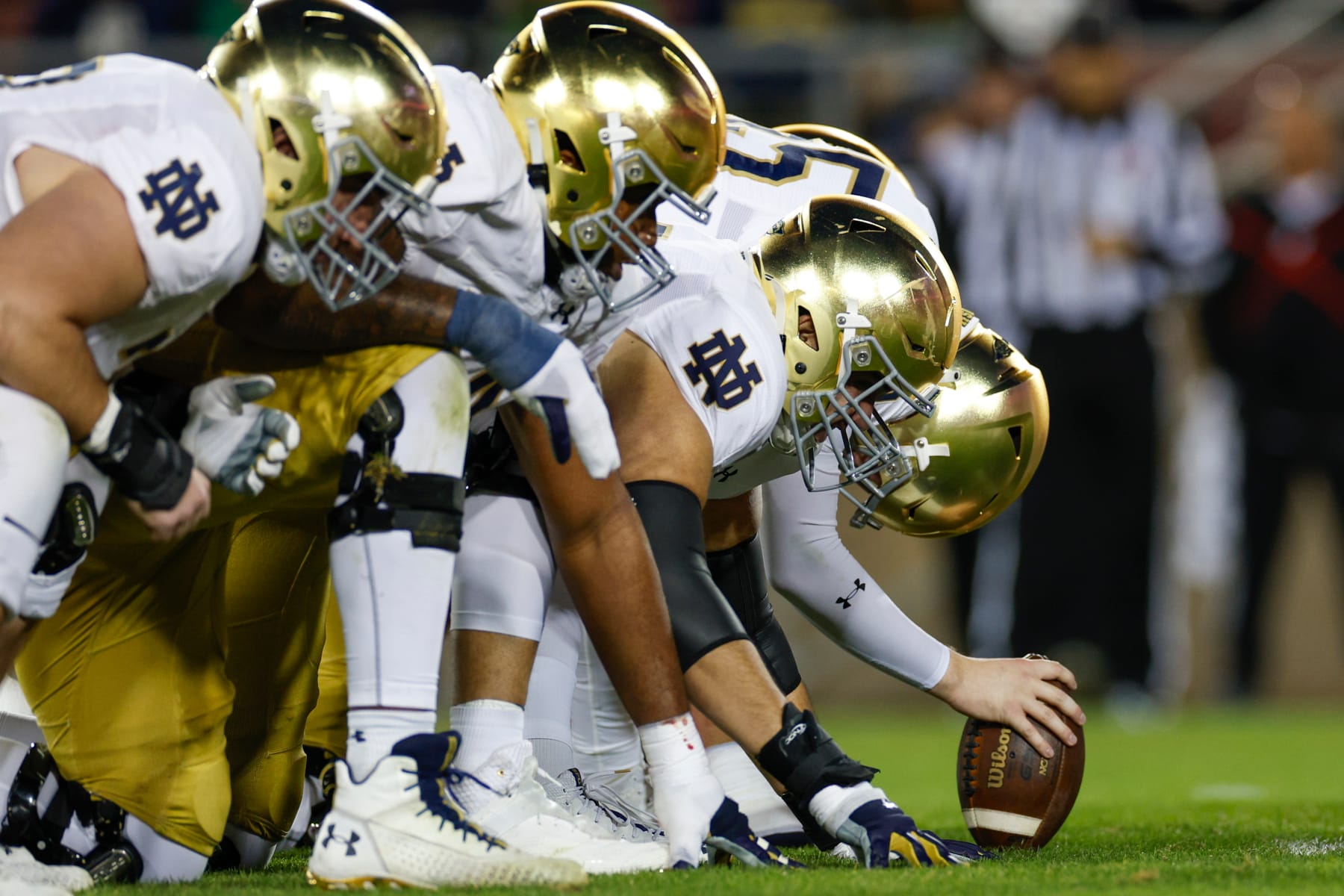 STANFORD, CALIFORNIA - NOVEMBER 25: The Notre Dame offensive line at the line of scrimmage during a game against the Stanford Cardinal at Stanford Stadium on November 25, 2023 in Stanford, California. (Photo by Brandon Sloter/Image Of Sport/Getty Images)