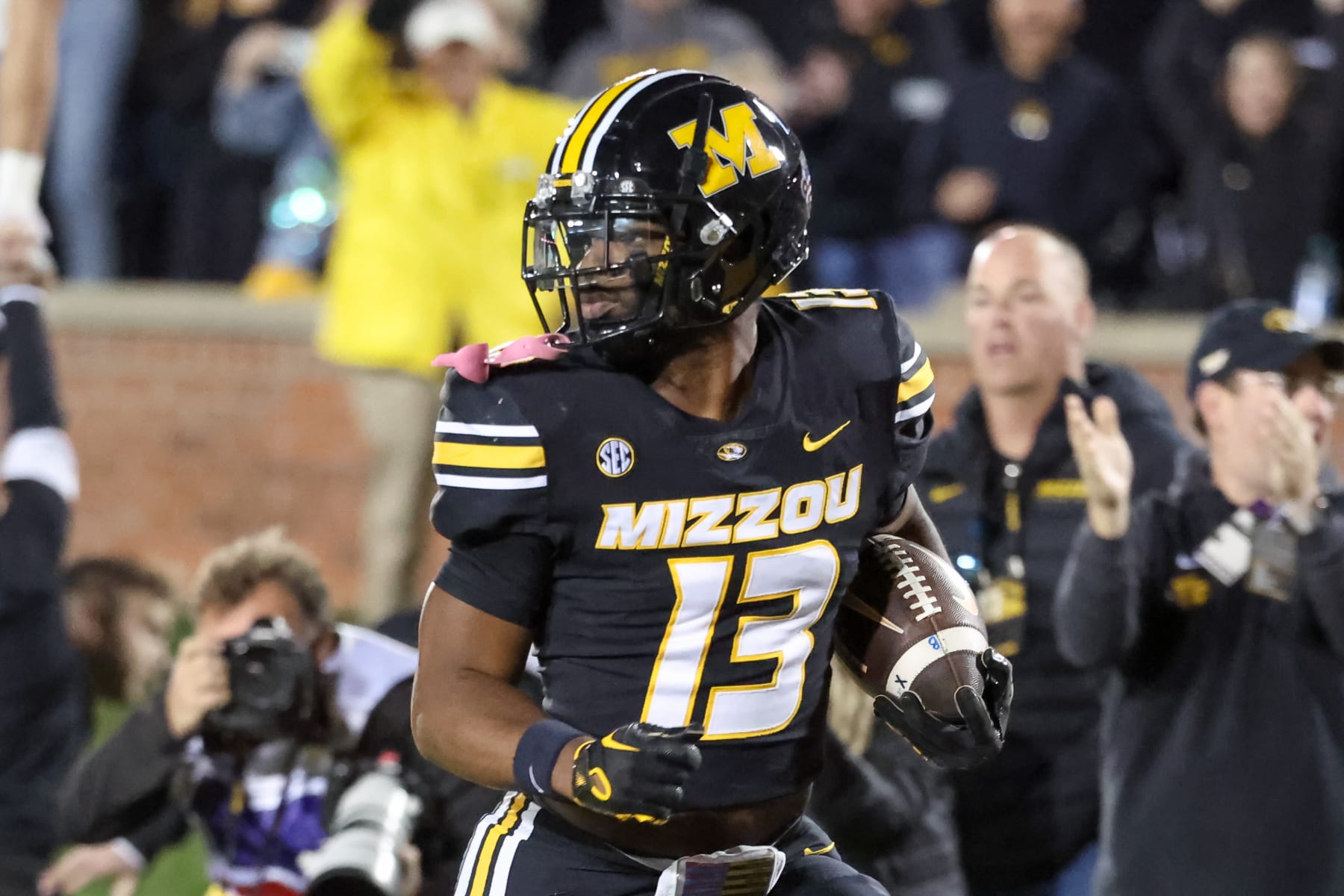 COLUMBIA, MO - NOVEMBER 11: Missouri Tigers defensive back Daylan Carnell (13) looks back as he returns an interception 38 yards for a touchdown in the fourth quarter of an SEC football game between the Tennessee Volunteers and Missouri Tigers on Nov 11, 2023 at Memorial Stadium in Columbia, MO. (Photo by Scott Winters/Icon Sportswire via Getty Images)