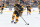BOSTON, MASSACHUSETTS - JANUARY 2: Brad Marchand #63 of the Boston Bruins skates against the Pittsburgh Penguins at the 2023 Discover NHL Winter Classic at Fenway Park on January 2, 2023 in Boston, Massachusetts. (Photo by Steve Babineau/NHLI via Getty Images)