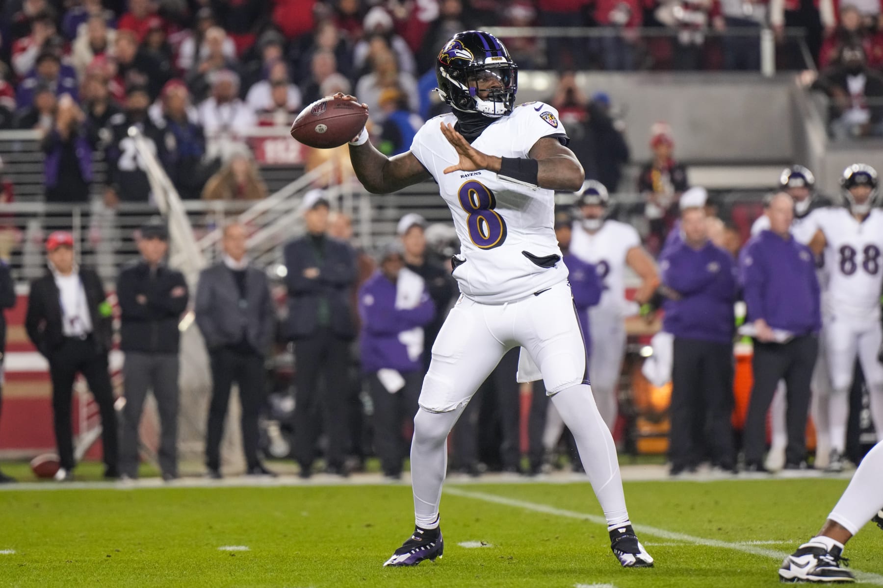 SANTA CLARA, CALIFORNIA - DECEMBER 25: Lamar Jackson #8 of the Baltimore Ravens looks to pass against the San Francisco 49ers during the first half at Levi's Stadium on December 25, 2023 in Santa Clara, California. (Photo by Loren Elliott/Getty Images)