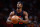 MIAMI, FLORIDA - DECEMBER 16: Jimmy Butler #22 of the Miami Heat shoots a free throw against the Chicago Bulls during the first quarter of the game at Kaseya Center on December 16, 2023 in Miami, Florida. NOTE TO USER: User expressly acknowledges and agrees that, by downloading and or using this photograph, User is consenting to the terms and conditions of the Getty Images License Agreement. (Photo by Megan Briggs/Getty Images)