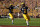 PASADENA, CALIFORNIA - JANUARY 01: Blake Corum #2 of the Michigan Wolverines scores a touchdown in the first quarter against the Alabama Crimson Tide during the CFP Semifinal Rose Bowl Game at Rose Bowl Stadium on January 01, 2024 in Pasadena, California. (Photo by Harry How/Getty Images)